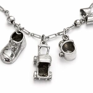 Vintage silver baby charm bracelet